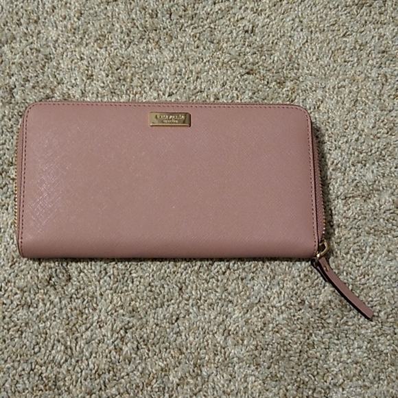 kate spade Handbags - Kate Spade large, pink (mauve is more accurate), zip wallet.